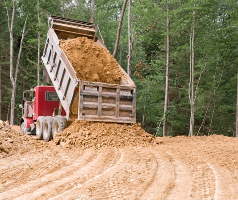 Semi Truck Dumping Dirt