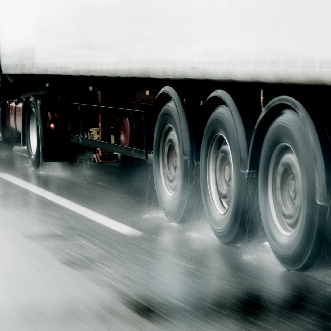 Semi Truck Wheels On Rainy Road